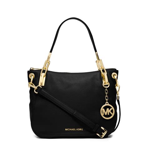 women wearing michael kors purses 1200 x 628|Michael Kors black shiny purse.